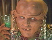 Quark surgically altered to look like a woman.